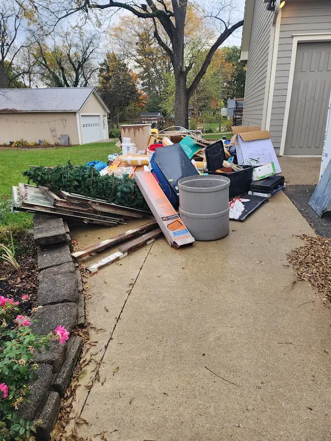 Dumpster being loaded with debris for 30 Yard Dumpster Rental in Downingtown